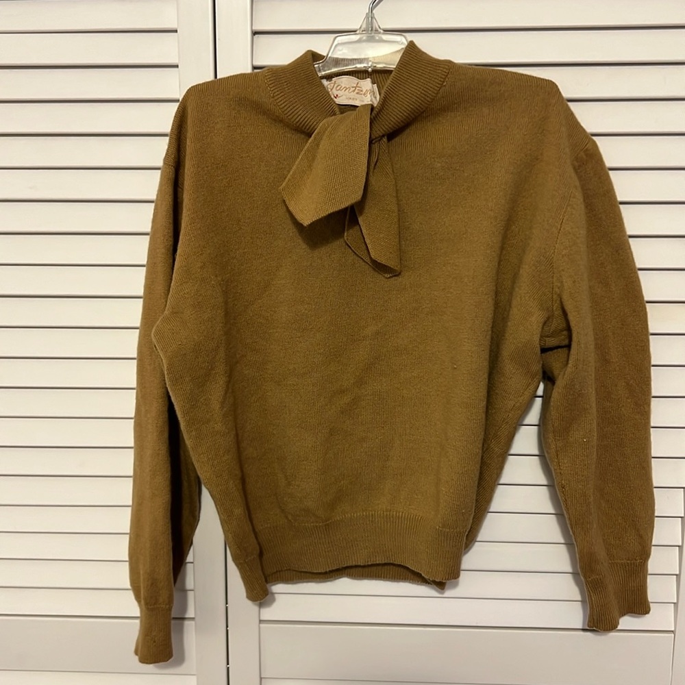 Vintage camel sweater. Fits like XXS. Some small defects as pictured